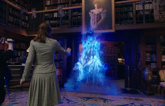 Abby (Melissa McCarthy) and Erin (Kristen Wiig) see the Gertrude the Ghost (Bess Rous) of Aldridge Mansion in Columbia Pictures' GHOSTBUSTERS.