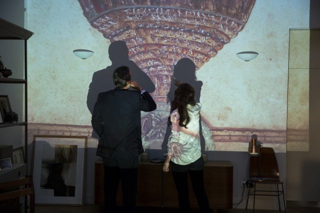 Langdon (Tom Hanks) and Sienna (Felicity Jones) study the Map Of Hell and notice it has been altered in Columbia Pictures' INFERNO.